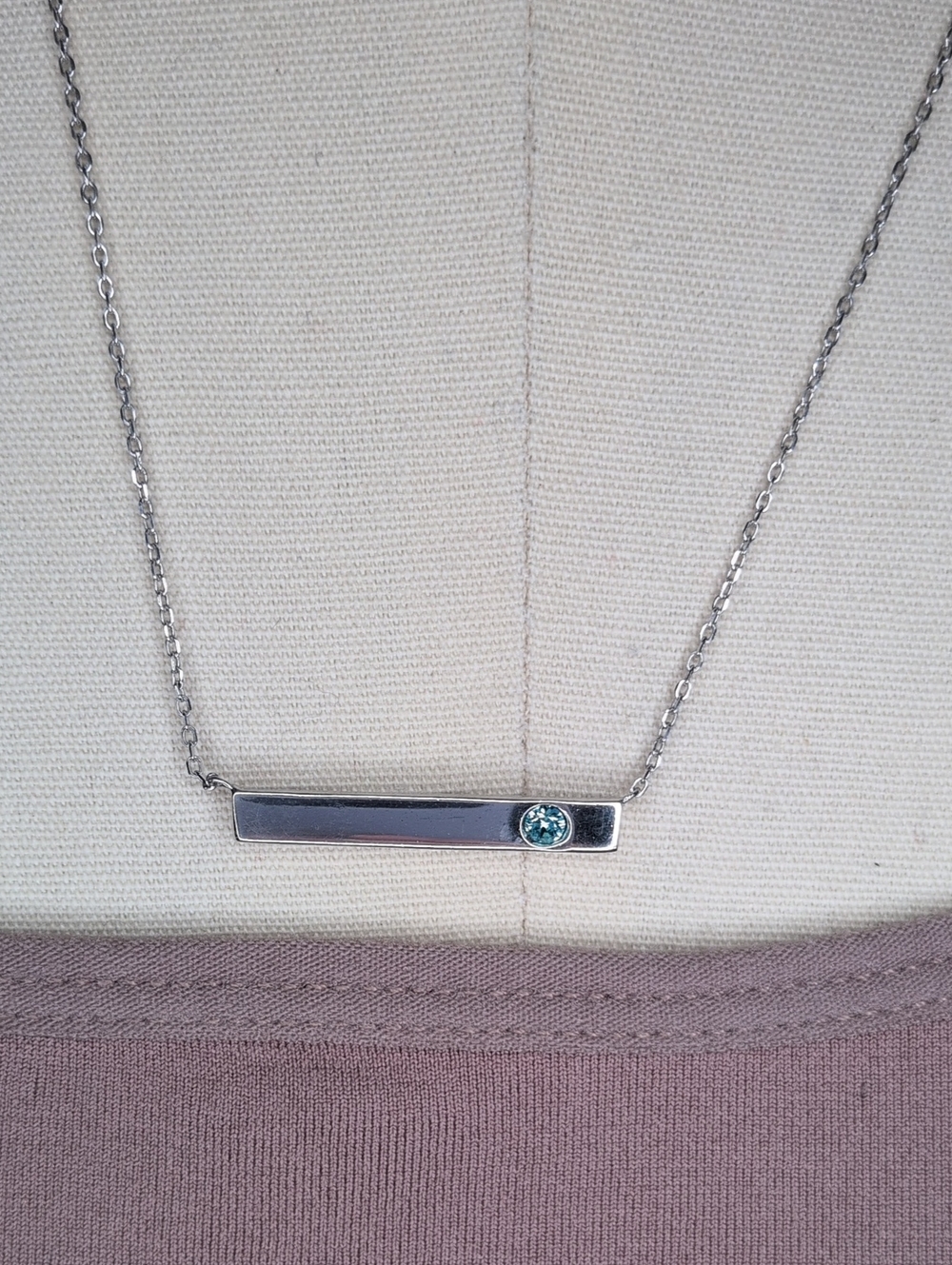Silver Bar Necklace with Light Blue Gem Accent
